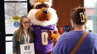 Female child with mascot