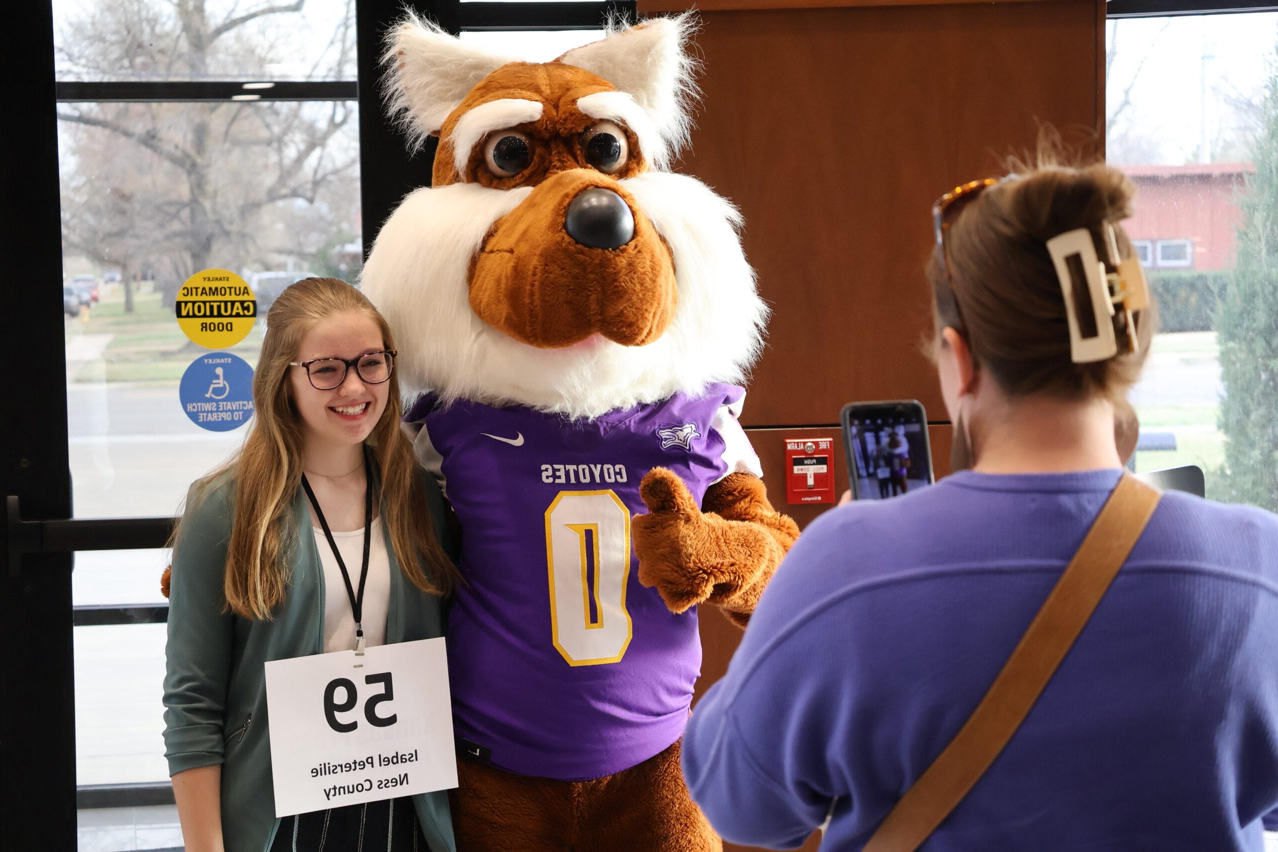 Female child with mascot